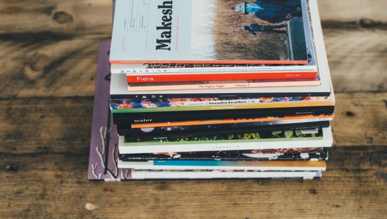 A stack of magazines Create a vision board on Pinterest