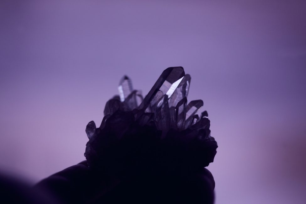 cluster of crystals on a purple background