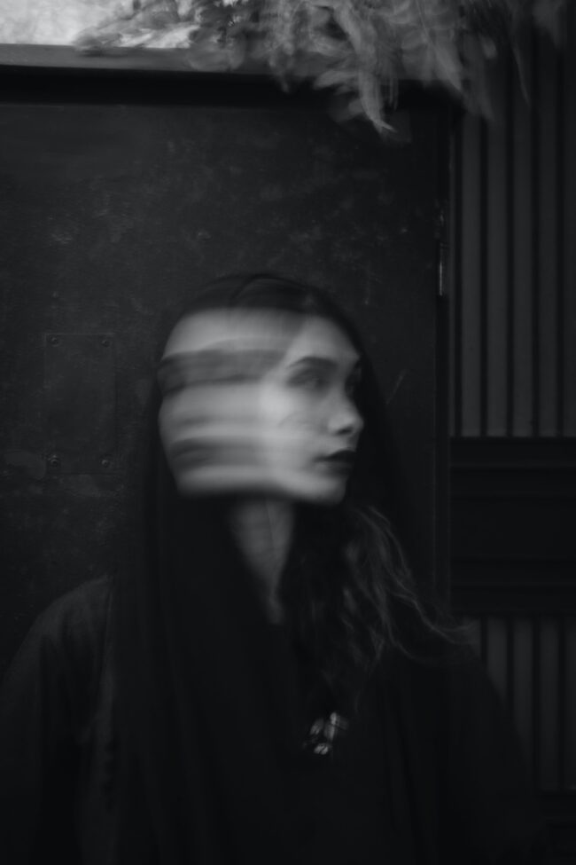 blurred image of woman's face