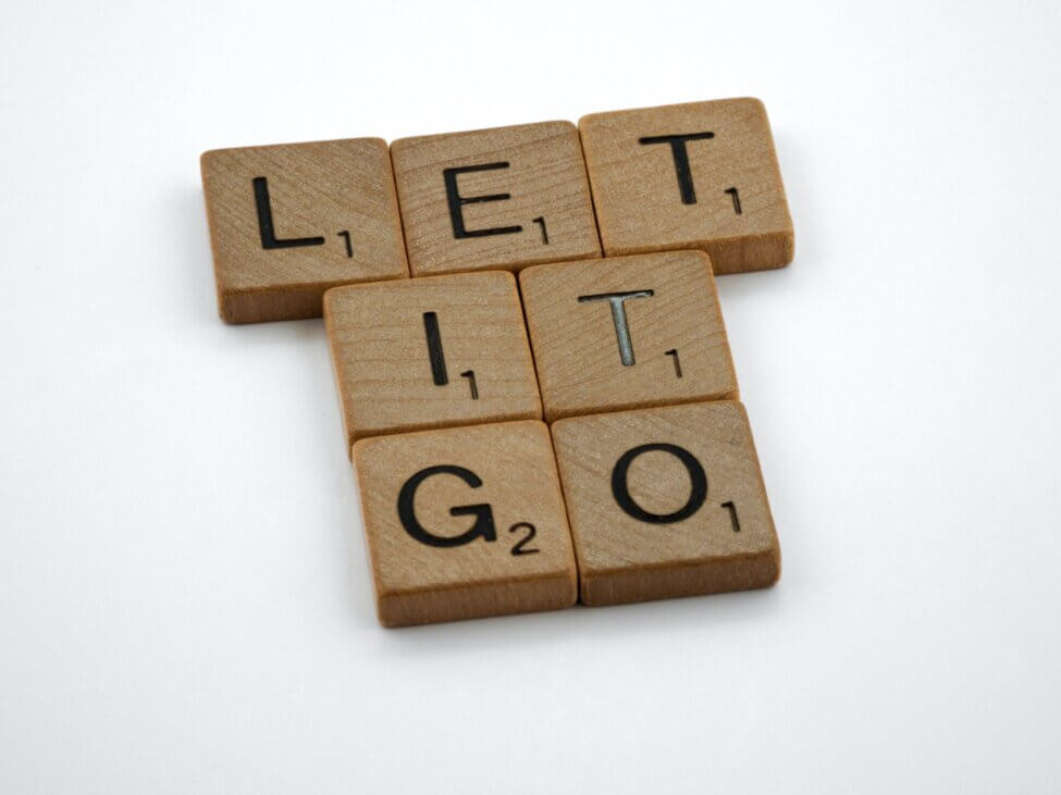 "Let it go" spelled in scrabble tiles